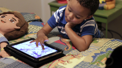 toddler with ipad