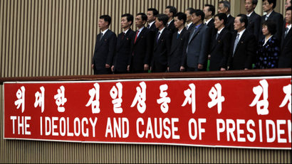 Participants stand during the World Congress on the Juche Idea held in Pyongyang, North Korea, Thursday, April 12, 2012. "Juche," or "self-reliance," is philosophy of North Korean founder Kim Il Sung whose 100th anniversary of the birth is marked on Sunday, April 15.