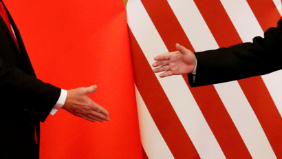 U.S. President Donald Trump and China's President Xi Jinping shake hands after making joint statements at the Great Hall of the People in Beijing, China, November 9, 2017.