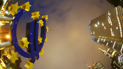 The euro sign landmark is seen at the headquarters of the European Central Bank in Frankfurt .