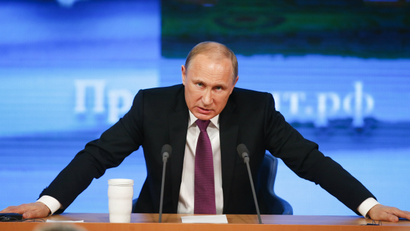 Russian President Vladimir Putin speaks during his annual end-of-year news conference in Moscow, December 18, 2014.