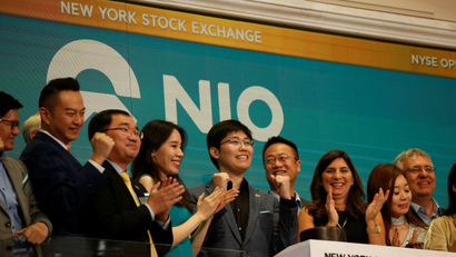 Chinese electric vehicle start-up Nio Incs first employee Tianshu LI, and companys leadership team celebrate at the New York Stock Exchange (NYSE) Opening Bell to commemorate the companys initial public offering (IPO) at the NYSE in New York, U.S., September 12, 2018.