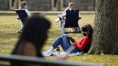 Georgetown University students take advantage of the warm sunshine in Washington
