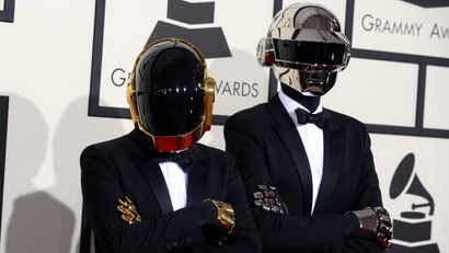 Daft Punk arrives at the 56th annual GRAMMY Awards at Staples Center on Sunday, Jan. 26, 2014, in Los Angeles.