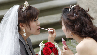 Chinese bride and bridesmaid
