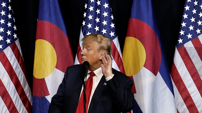 U.S. Republican presidential nominee Donald Trump puts his hand to his ear as he speaks at a campaign rally in Pueblo, Colorado, U.S., October 3, 2016.