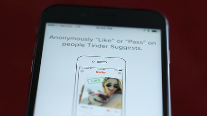 The dating app Tinder is shown on an Apple iPhone