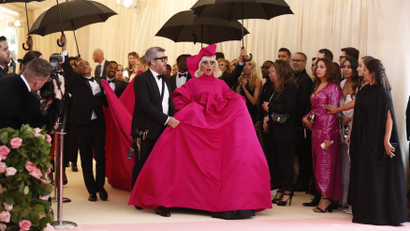 Lady Gaga arrives at the 2019 Met Gala in a hot pink Brandon Maxwell gown