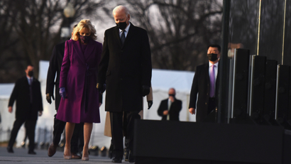 Joe and Dr. Jill Biden walk on the national mall after a memorial service to all those who died in the Covid-19 pandemic so far.