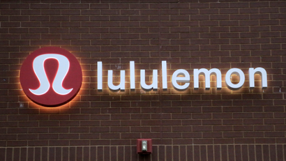 FILE- This June 5, 2017, file photo shows the Lululemon Athletica logo outside a store in Dedham, Mass. Lululemon Athletica Inc. reports earnings Wednesday, Dec. 5, 2018. (AP Photo/Steven Senne, File)