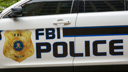 An FBI vehicle is seen outside the Federal Bureau of Investigation building.