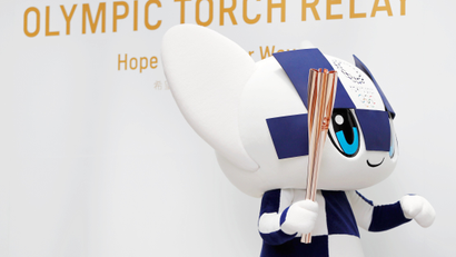 Tokyo 2020 Olympic Games mascot Miraitowa holds the torch of the Tokyo 2020 Olympic Games during a Torch Relay event to mark the 300-day milestone to the starting date of the torch relay, in Tokyo, Japan June 1, 2019.