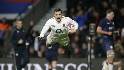 England's Jonny May scoring a try in a recent rugby match