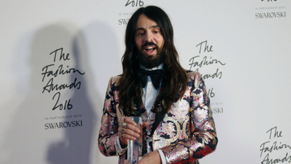 Designer Alessandro Michele poses in the winners room after winning the International Accessories Designer Award at the Fashion Awards in London, Monday, Dec. 5, 2016. (Photo by Joel Ryan/Invision/AP)