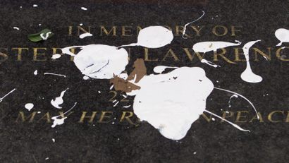 White paint covers part of the memorial plaque for murdered black British teenager Stephen Lawrence in 1999. The plaque was defaced only hours after the release of the Stephen Lawrence Report which accused the British Metropolitan Police of institutional racism and incompetence in handling the murder enquiry.