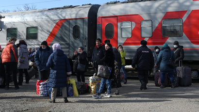 Evacuees from separatist-controlled regions in eastern Ukraine leave Taganrog in the Rostov region