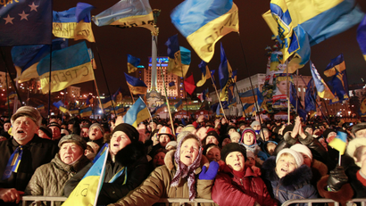 Pro-European integration protesters attend a rally in Maidan Nezalezhnosti on Independence Square in central Kiev, December 17, 2013. Russia threw Ukraine an economic lifeline on Tuesday, agreeing to buy $15 billion (£9.23 billion) of Ukrainian debt and to reduce the price its cash-strapped neighbour pays for vital Russian gas supplies by about one-third.