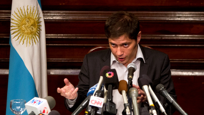 Argentina's Economy Minister Axel Kicillof speaks to the media at a press conference at the Argentine Consulate in New York July 30, 2014. Kicillof on Wednesday said the country offered a group of holdout creditors the same reduced payment terms it has agreed to pay other holders of its restructured bonds, but the holdouts refused the offer. The holdouts, a group of hedge funds that bought the bonds at a steep discount following Argentina's default on $100 billion of debt in 2002, also refused to ask a U.S. court to stay an order the blocks Argentina from paying its other creditors, Kicillof said.
