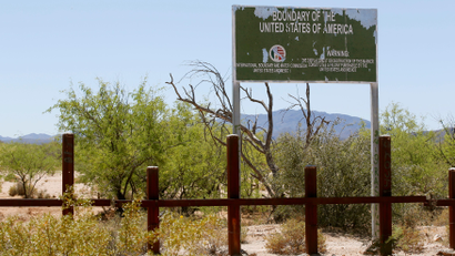 A sign marking the U.S.- Mexico border