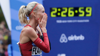 Shalene Flanagan of the United States reacts after crossing the finish line first in the women's division of the New York City Marathon in New York, Sunday, Nov. 5, 2017. (AP Photo/Seth Wenig)