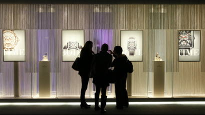 Women visit the Milus showcase on the eve of the opening of the Baselworld in Basel, Switzerland.