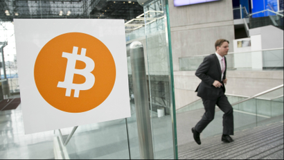A man arrives for the Inside Bitcoins conference and trade show in New York.