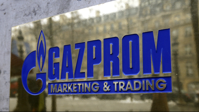 The logo of Gazprom marketing department is seen in front of an office.