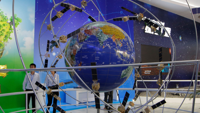 In this file photo taken Tuesday, Nov. 6, 2018, a model of Chinese BeiDou navigation satellite system is displayed during the 12th China International Aviation and Aerospace Exhibition, also known as Airshow China 2018, in Zhuhai city, south China's Guangdong province. The Beidou will link more than 30 satellites providing real-time geospatial information worldwide _ China's answer to the GPS (Global Positioning System). (AP Photo/Kin Cheung)