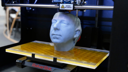A 3D printer MakerBot Replicator 2 produces a sculpture at the CeBit computer fair in Hanover.