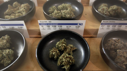 Different types of cannabis sit on display at Harborside marijuana dispensary, Monday, Jan. 1, 2018, in Oakland, California.