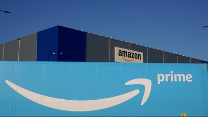 The logo of Amazon Prime Delivery is seen on the trailer of a truck outside the company logistics center in Lauwin-Planque, northern France.