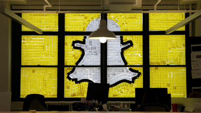 Snap's logo made out of Post-its.