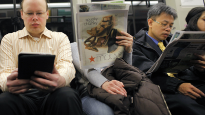 people reading on train