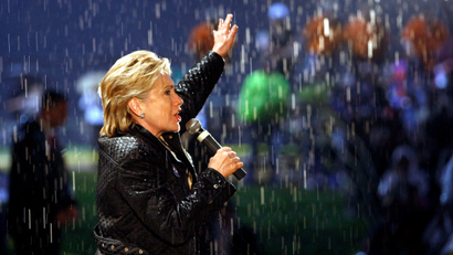 Democratic presidential hopeful, Sen. Hillary Rodham Clinton, D-N.Y., rallies the crowd in the rain as she campaigns in McKeesport, Pa., Saturday, April 19, 2008.