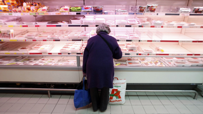 A woman shops at a supermarket in Nice, southern France.