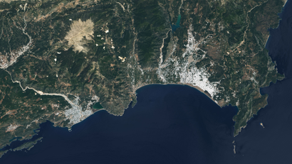 A satellite image of Turgreen, Turkey. Large areas are white because of the use of plastic in farming.