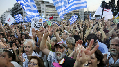 Demonstrators shout slogans during an anti-austerity rally in Syntagma Square in Athens, Greece.