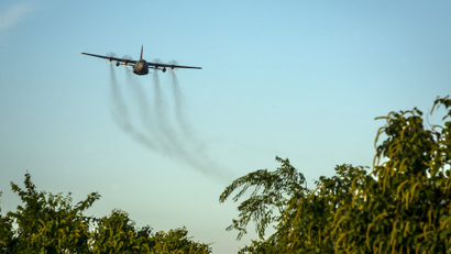 Air force plane spraying insecticide