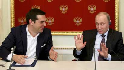 Russian President Vladimir Putin (R) and Greek Prime Minister Alexis Tsipras attend a signing ceremony at the Kremlin in Moscow, April 8, 2015.