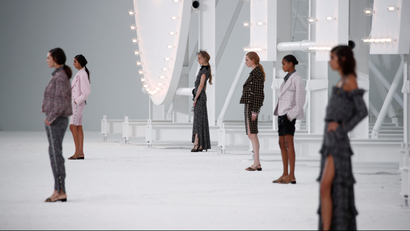 Models present creations by designer Virginie Viard as part of her Spring/Summer 2021 ready-to-wear collection show for fashion house Chanel