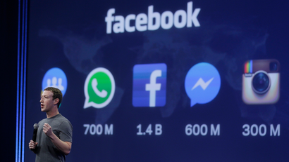 CEO Mark Zuckerberg gives the keynote address during the Facebook F8 Developer Conference Wednesday, March 25, 2015, in San Francisco. Facebook is trying to mold its Messenger app into a more versatile communications channel as smartphones create new ways for people to connect with friends and businesses beyond the walls of the company's ubiquitous social network. (AP Photo/Eric Risberg)