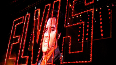Video of Elvis Presley singing as his band plays below at the start of the Elvis Presley 25th Anniversary Concert in Memphis, Tenn.