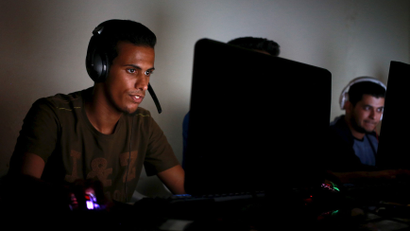 Libyans play computer games at an internet cafe in Benghazi, Libya April 10, 2016. Picture taken April 10, 2016.