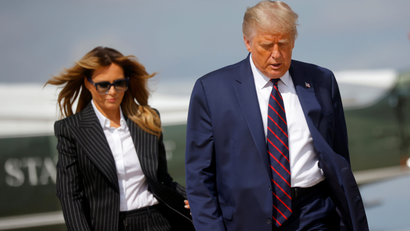 U.S. President Donald Trump and first lady Melania Trump board Air Force One