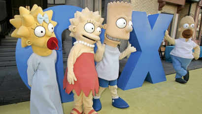 Characters from "The Simpsons" pose at the series' 350th episode party in Los Angeles.