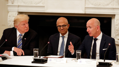 Amazon CEO Jeff Bezos with president Donald Trump.