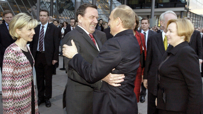 "Schroederization" in action, as Putin and Schroeder hug.