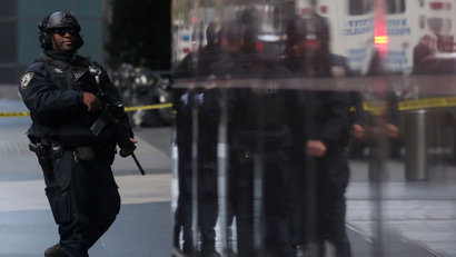 A member of the NYPD outside the Time Warner Center after a suspicious package was found inside CNN headquarters, October 24, 2018.