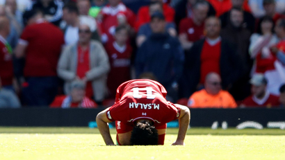 Soccer Football - Premier League - Liverpool vs Brighton &amp; Hove Albion - Anfield, Liverpool, Britain - May 13, 2018 Liverpool's Mohamed Salah celebrates scoring their first goal.