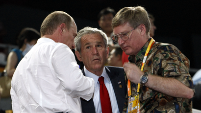 U.S. President George W. Bush and Russia's Prime Minister Vladimir Putin (L) attend the opening ceremony of the Beijing 2008 Olympic Games at the National Stadium, August 8, 2008. The stadium is also known as the Bird's Nest.